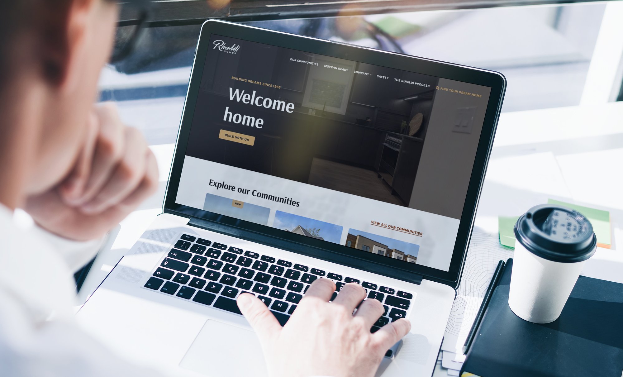 Rinaldi Homes website on laptop